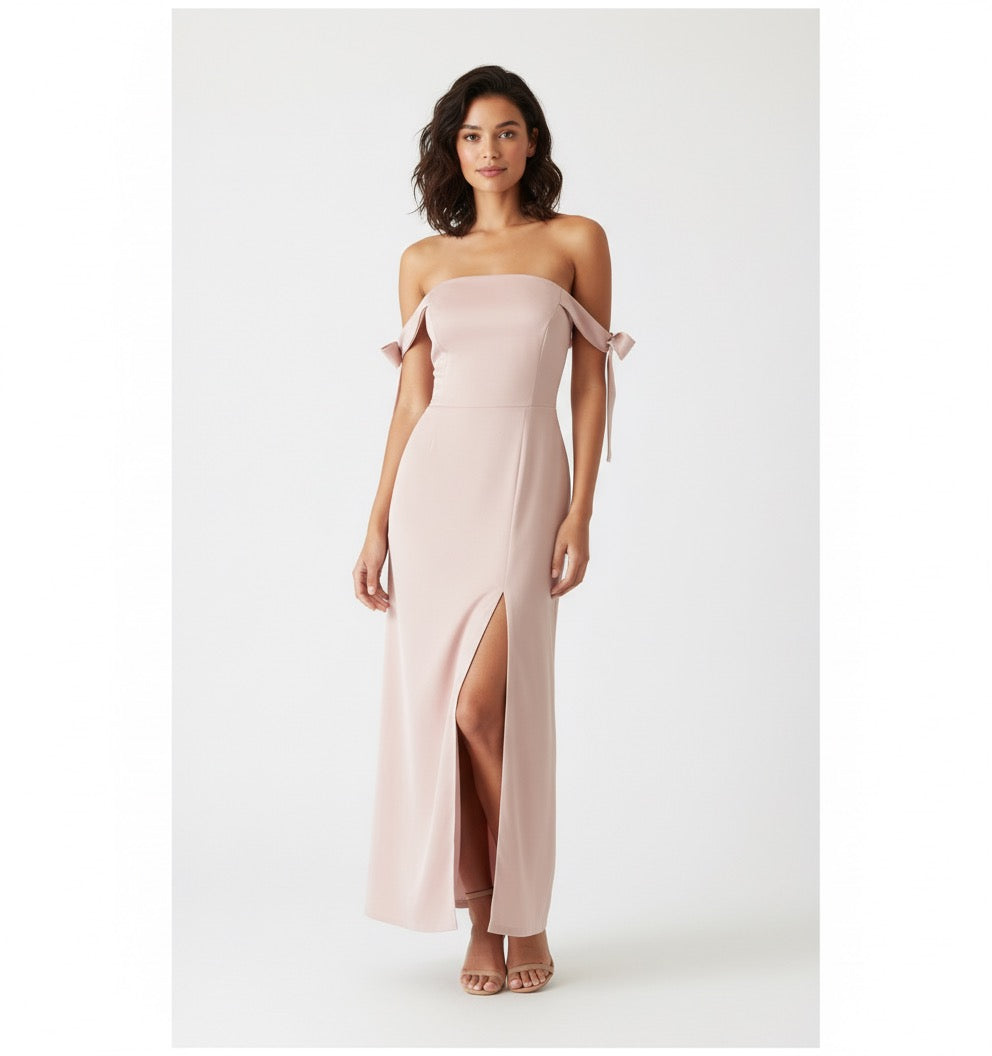 Vestido nudos en brazo rosa palo.