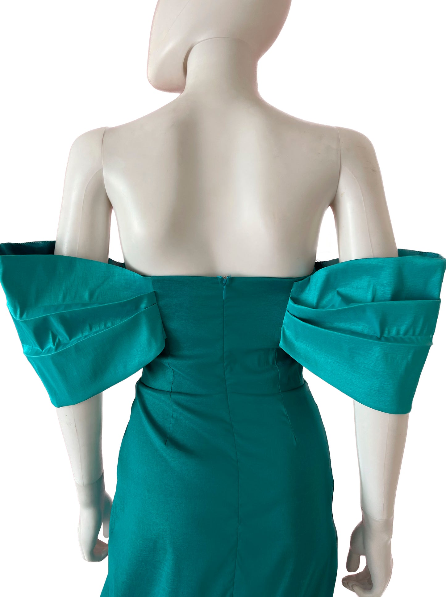 Vestido moño en brazos turquesa.