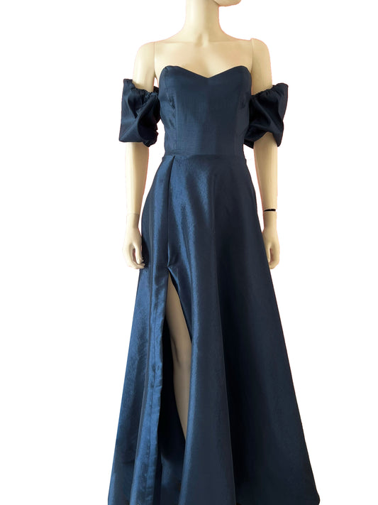 Vestido mangas globo falda amplia color petróleo.