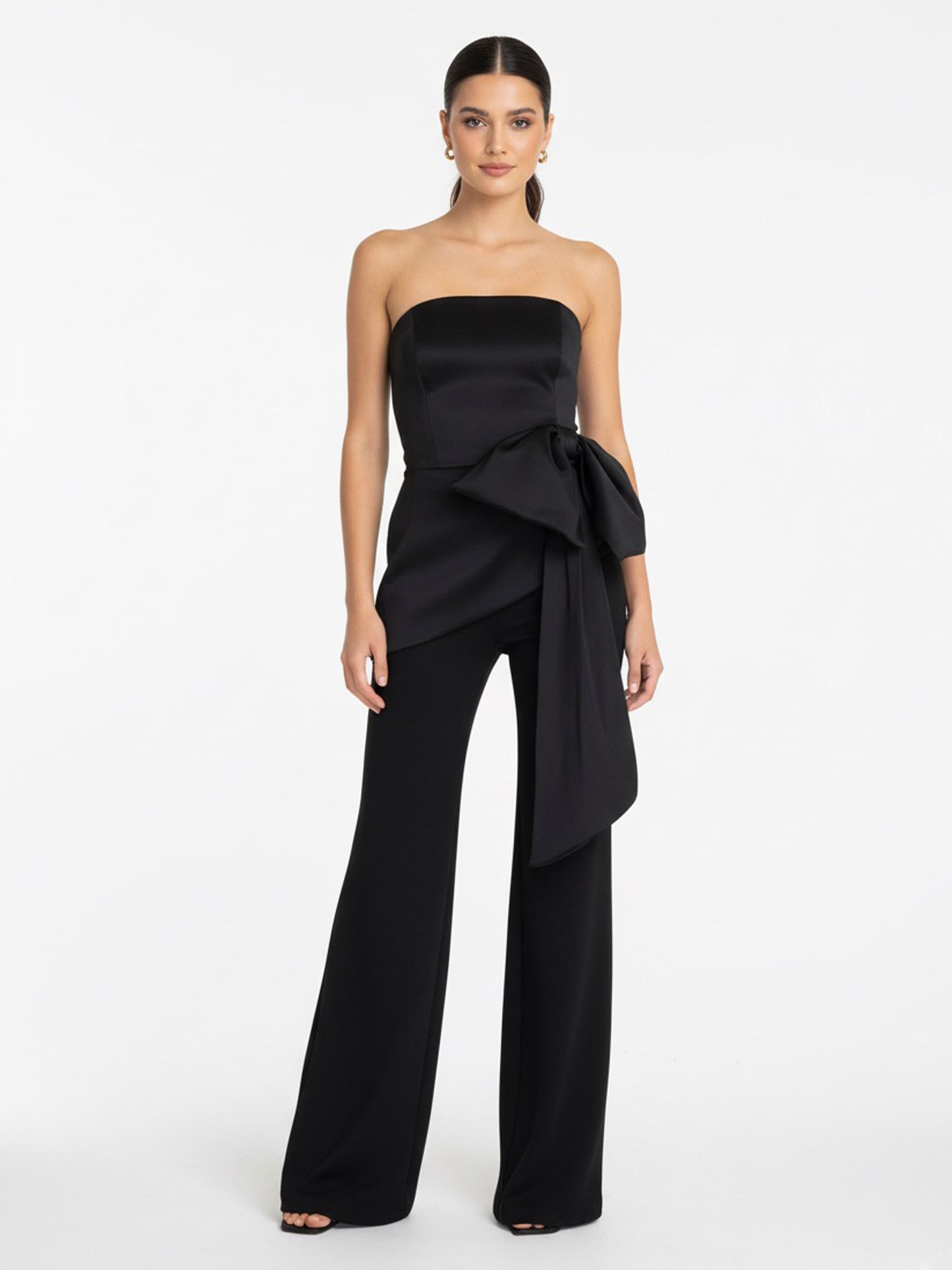 Set pantalon y top con moño negro.