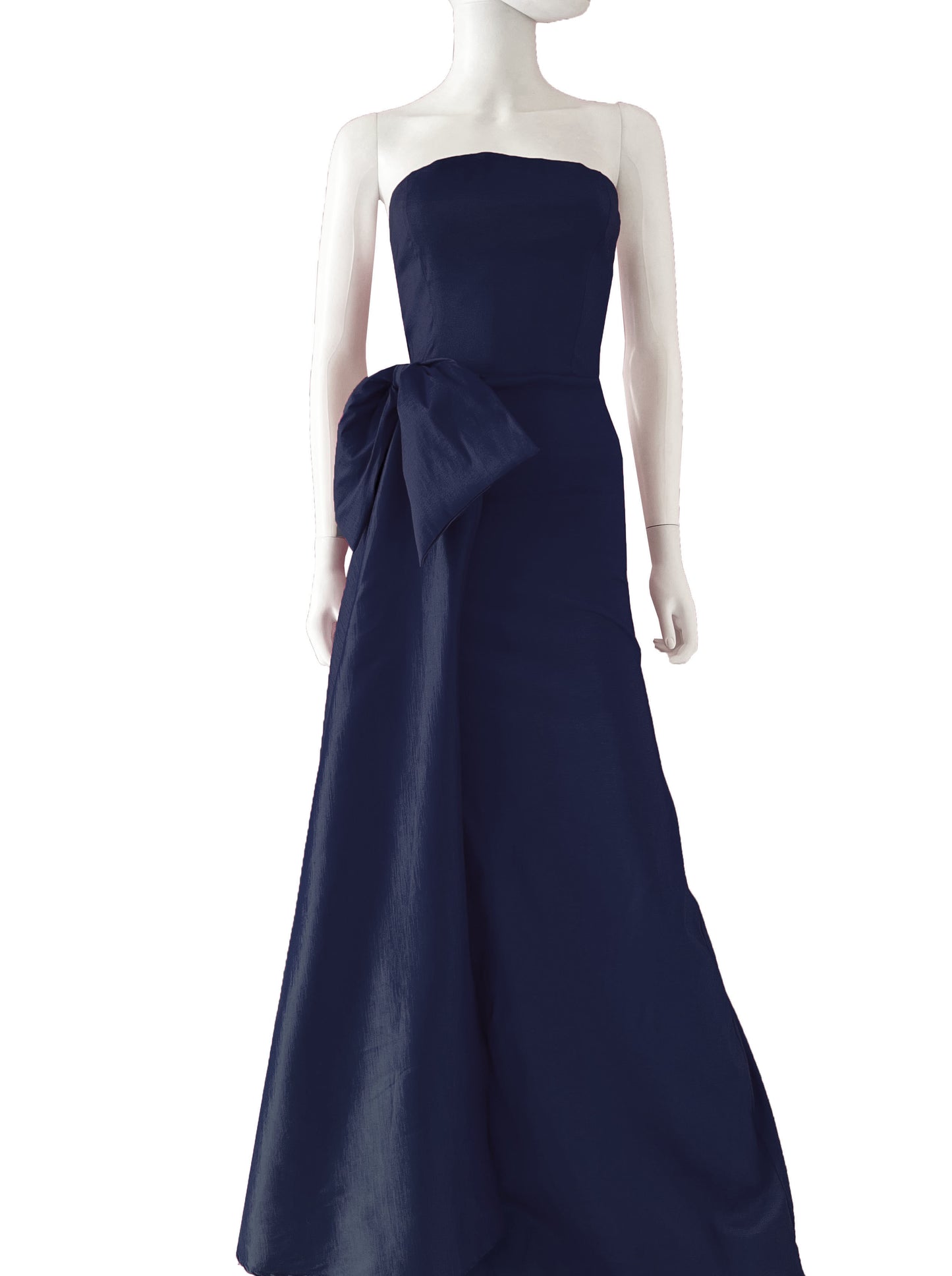Vestido cauda lateral con moño azul marino.