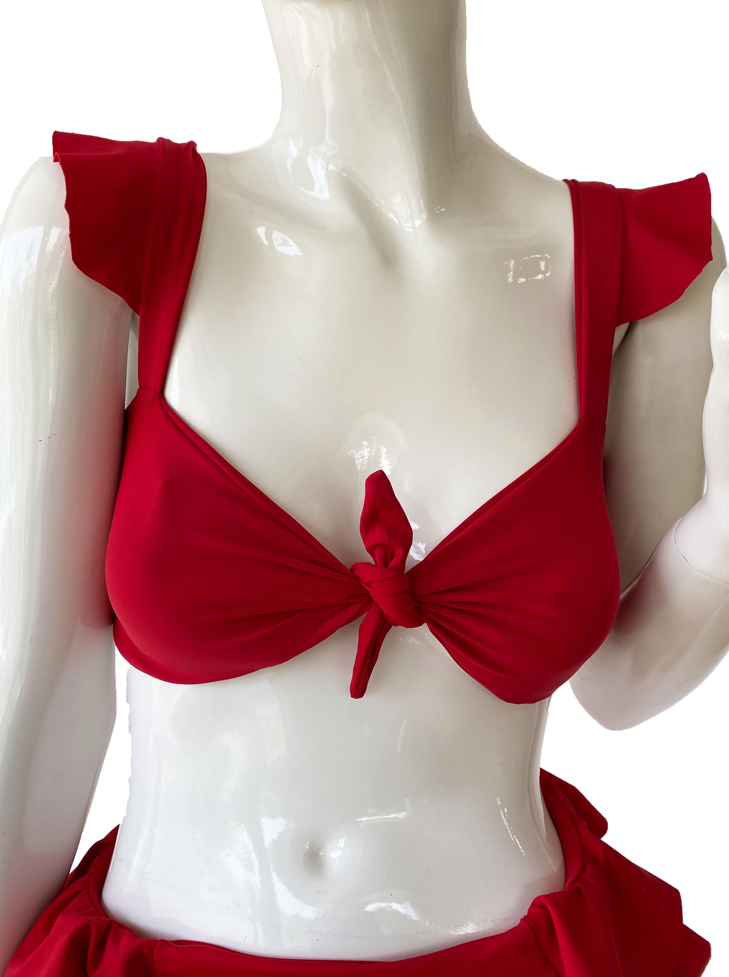 Top nudo volantes rojo.