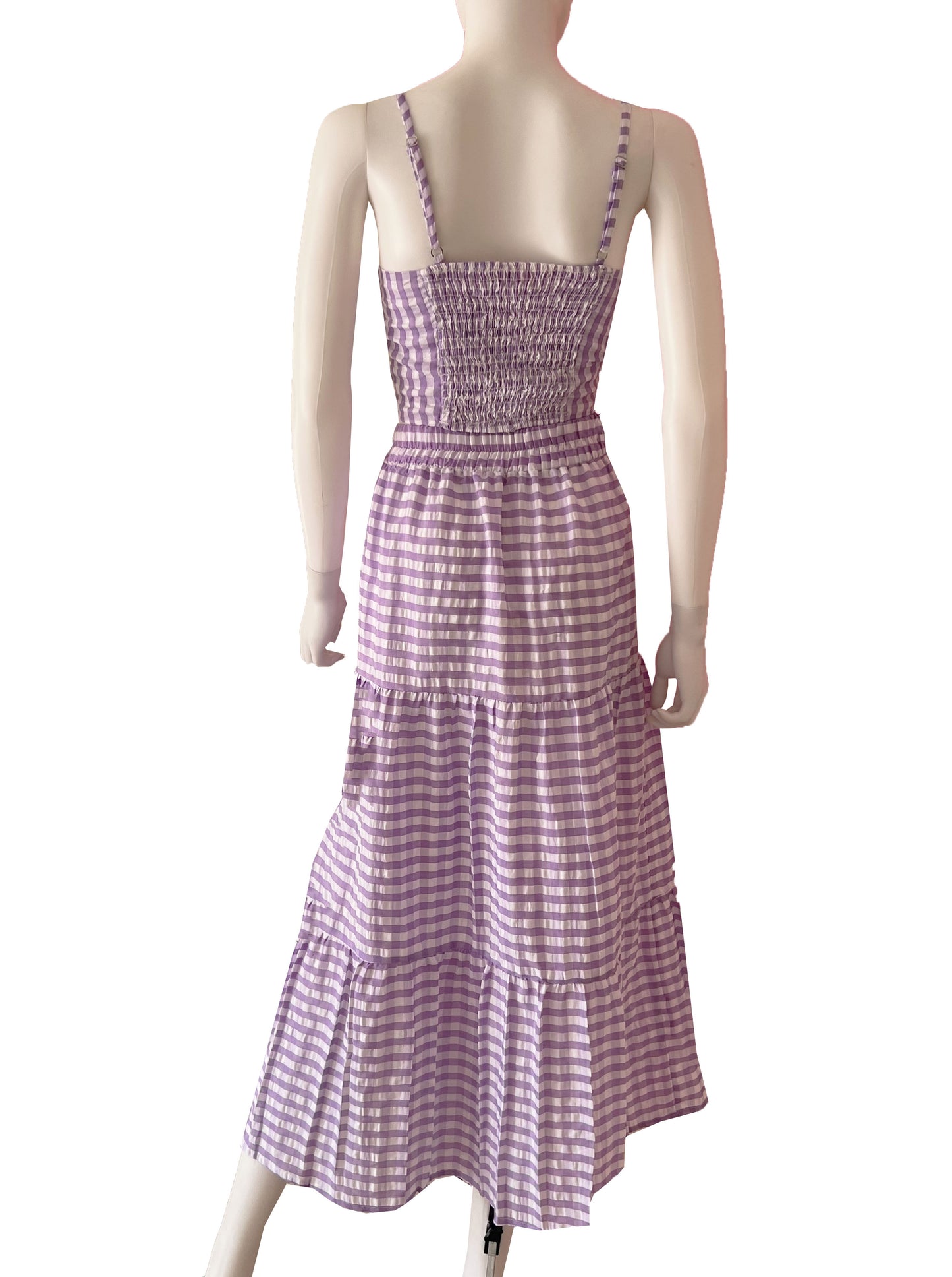 Set cuadros top y falda lila.