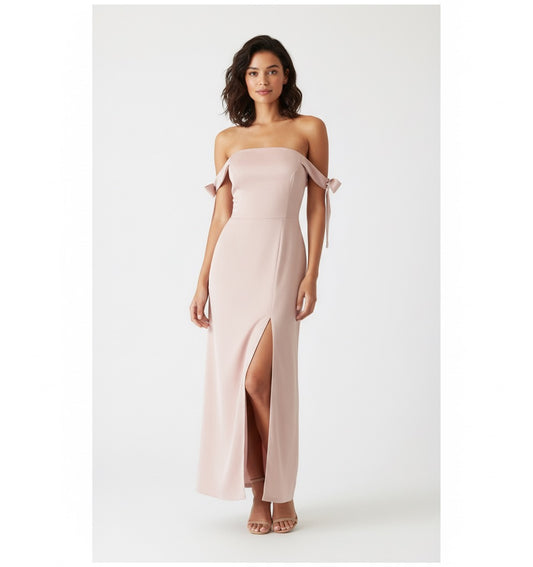 Vestido nudos en brazo rosa palo.