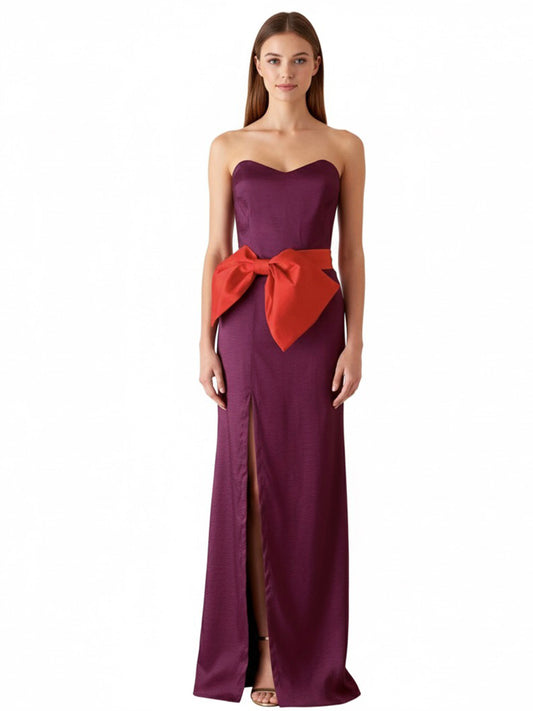 Vestido buga cinturon con moño rojo .
