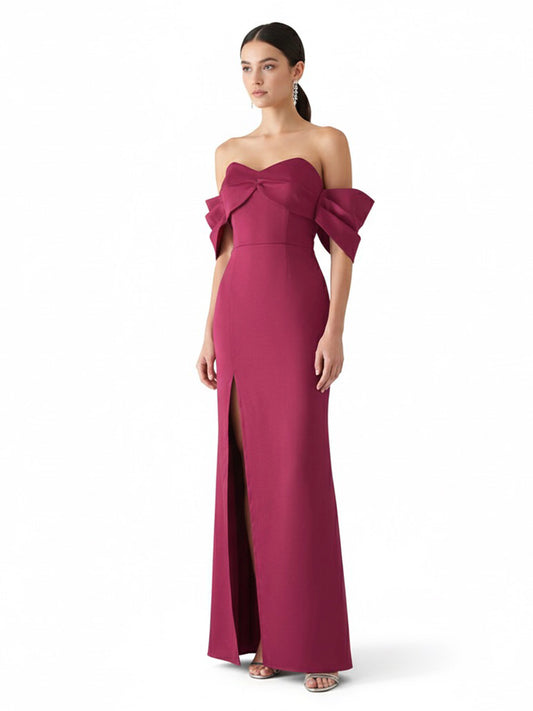 Vestido moño en brazos magenta.