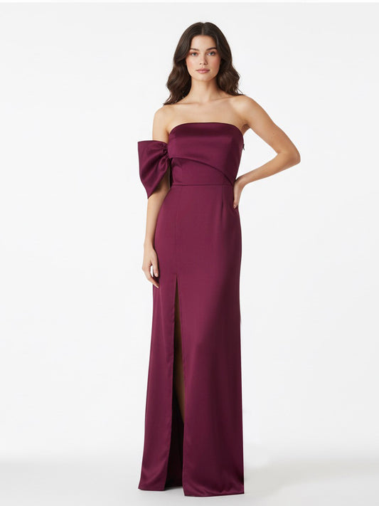 Vestido moño en un brazo rosa sangría.