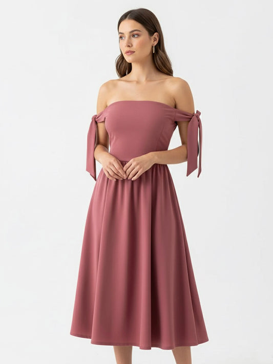 Vestido midi amarres en brazo.