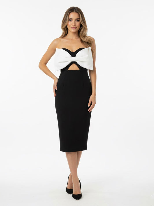 Vestido negro moño blanco midi.