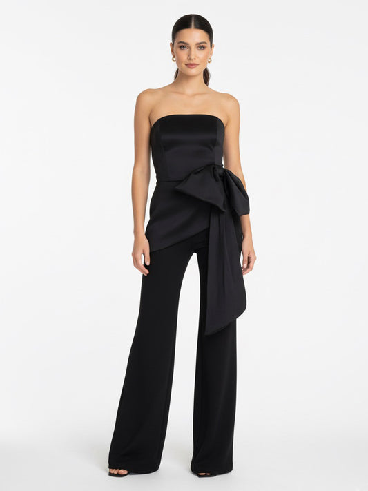 Set pantalon y top con moño negro.