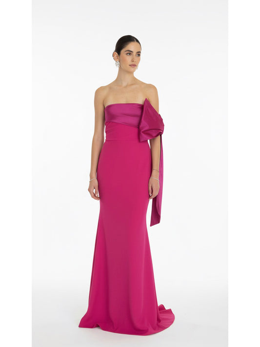 Vestido moño en brazo rosa mexicano.