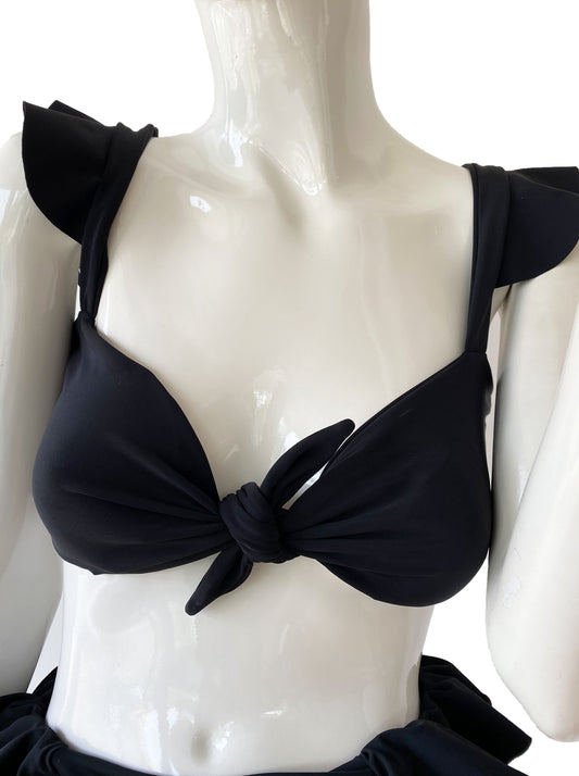 Top nudo volantes negro.
