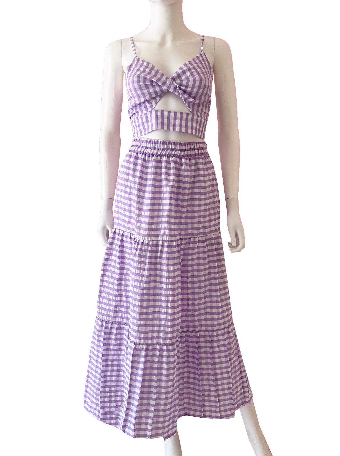 Set cuadros top y falda lila.