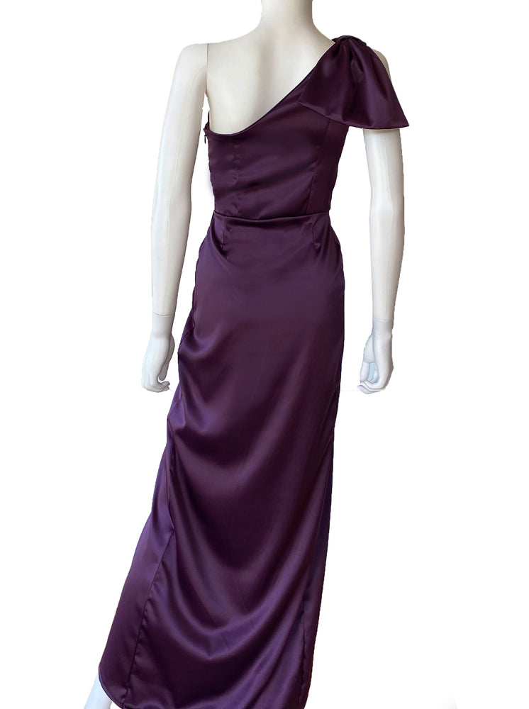 Vestido moño falda tulipán morado.